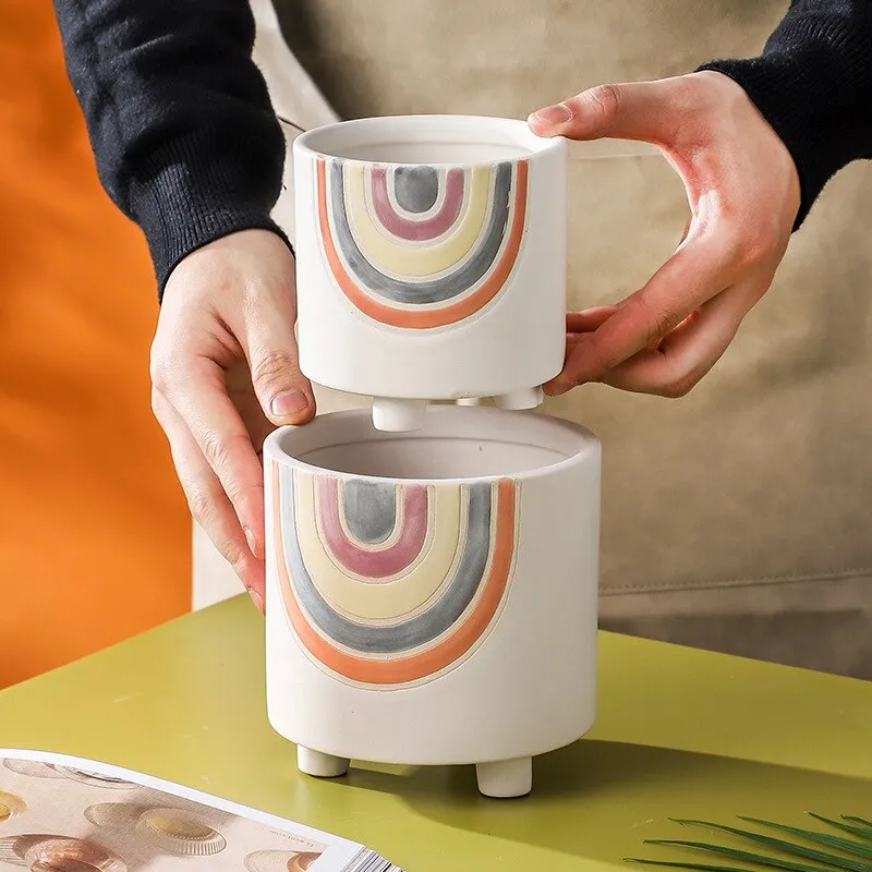 Cute plant pots with drainage hole
