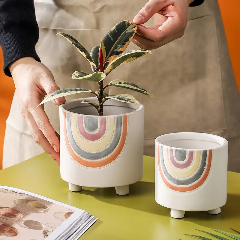 Cute plant pots with drainage hole